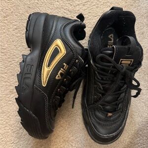 Fila Black Sneakers with Gold Highlights